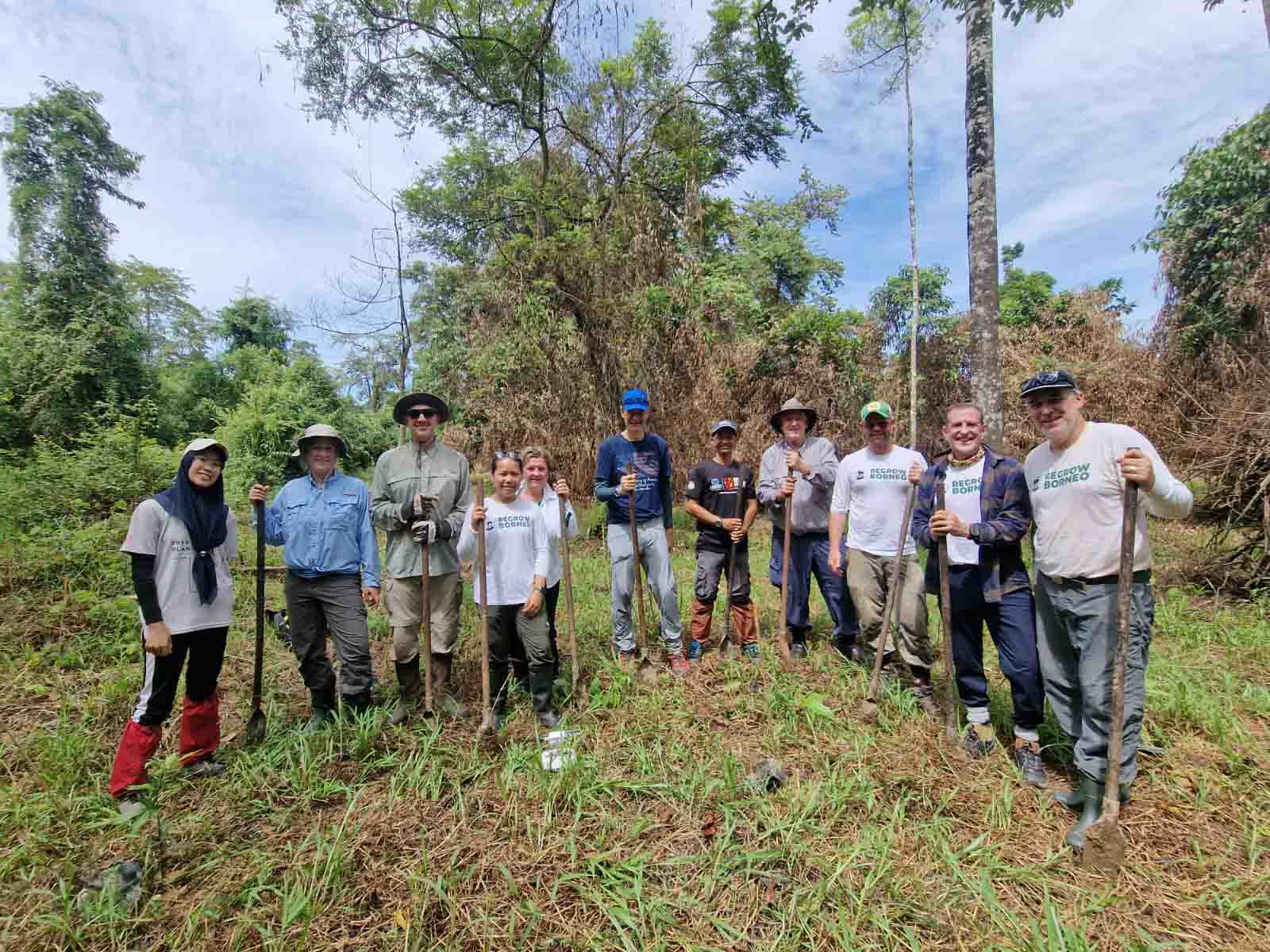 Delegation from Cardiff and Wyoming visit the Regrow Borneo reforestation site.