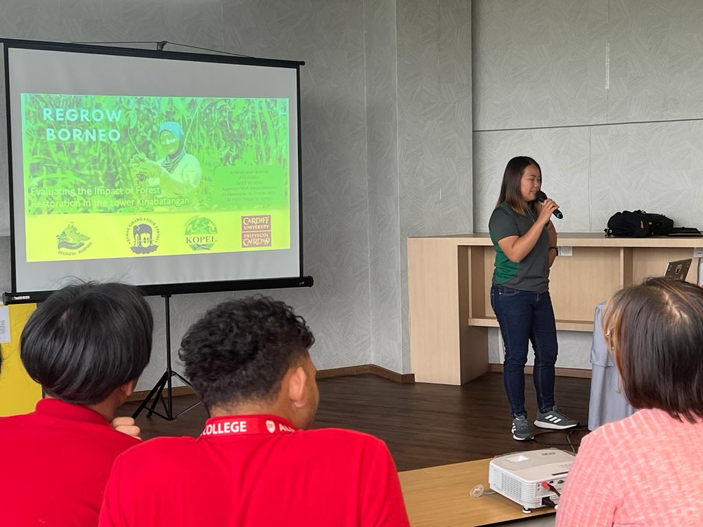 Regrow Borneo PhD student Maz delivering her talk