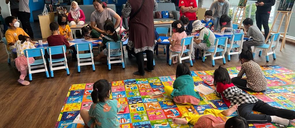 Colouring activity for kids at the Sabah State Library during the education event